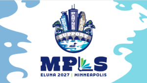 Image of city buildings over a bridge with the text Mentor, Partner, Lead, Support.